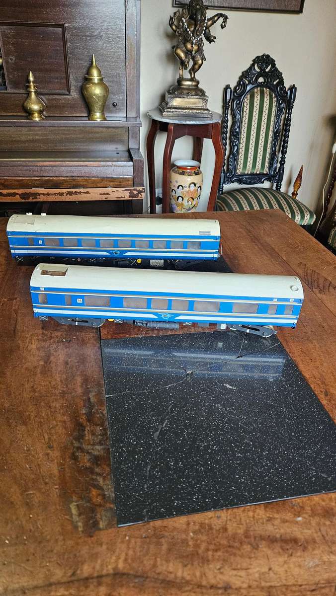 Two Blue Train Coaches
