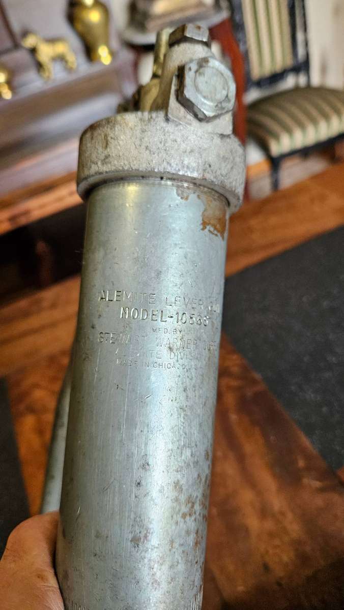 Two Manual Greas Guns