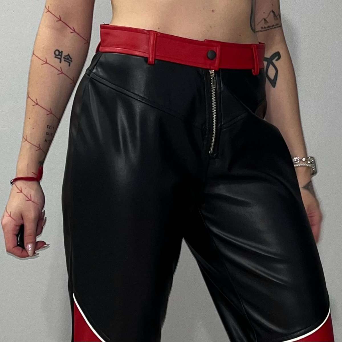 Black and red pleather pants | Soft and stretchy material | Size 36