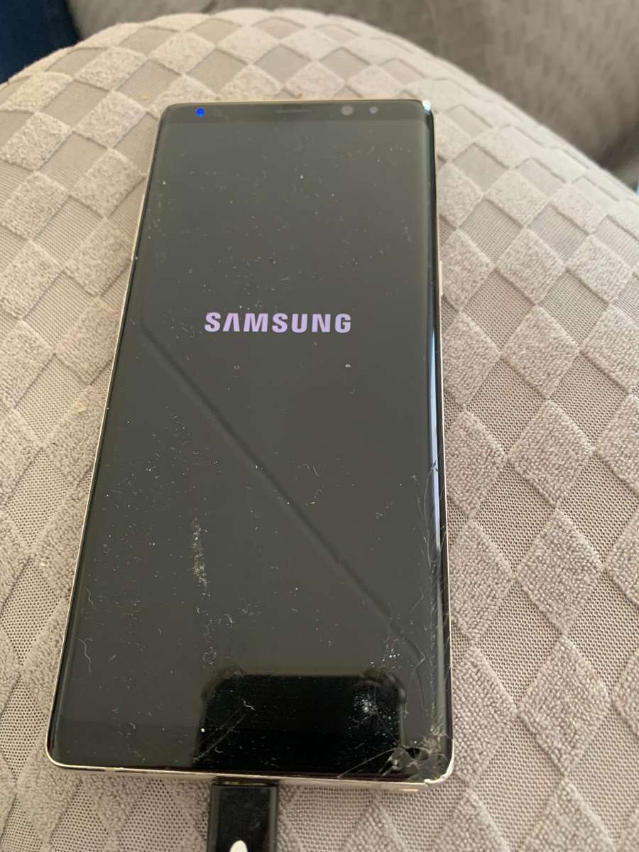 Samsung Galaxy Note 8 with 2 other phones