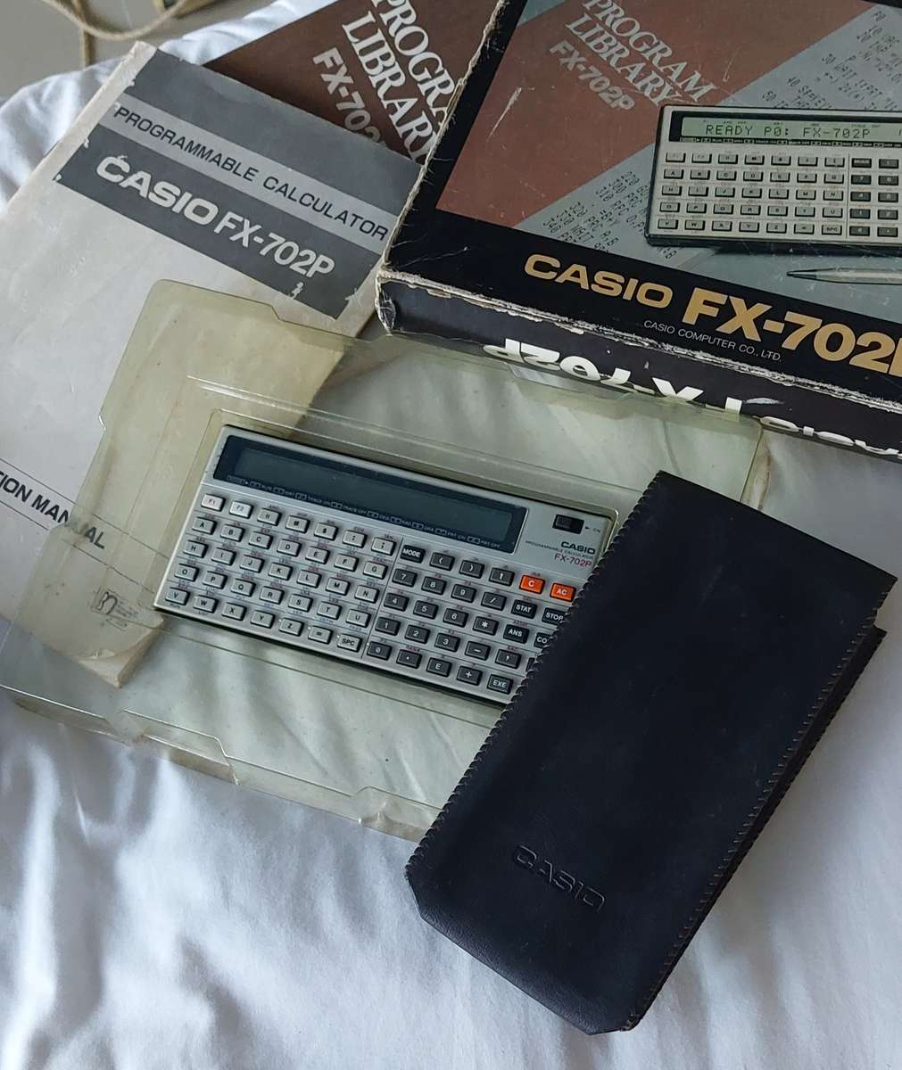 FOR THE COLLECTOR CASSIO BUNDLE FX-702P CALCULATOR AND CASSIO CASSETTE INTERPHASE BOTH WORK TOGETHER