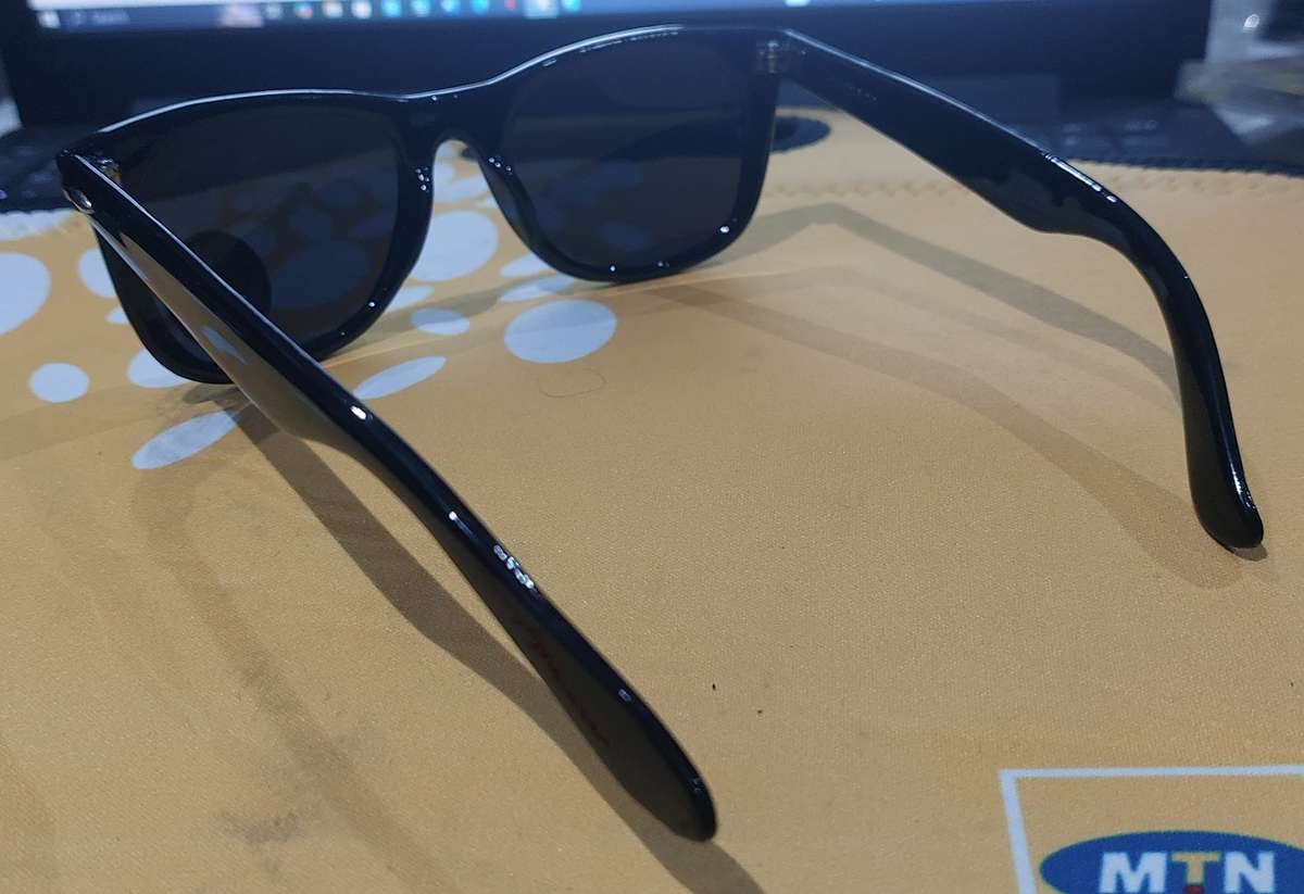 super dark  SUN GLASSES money back guarantee