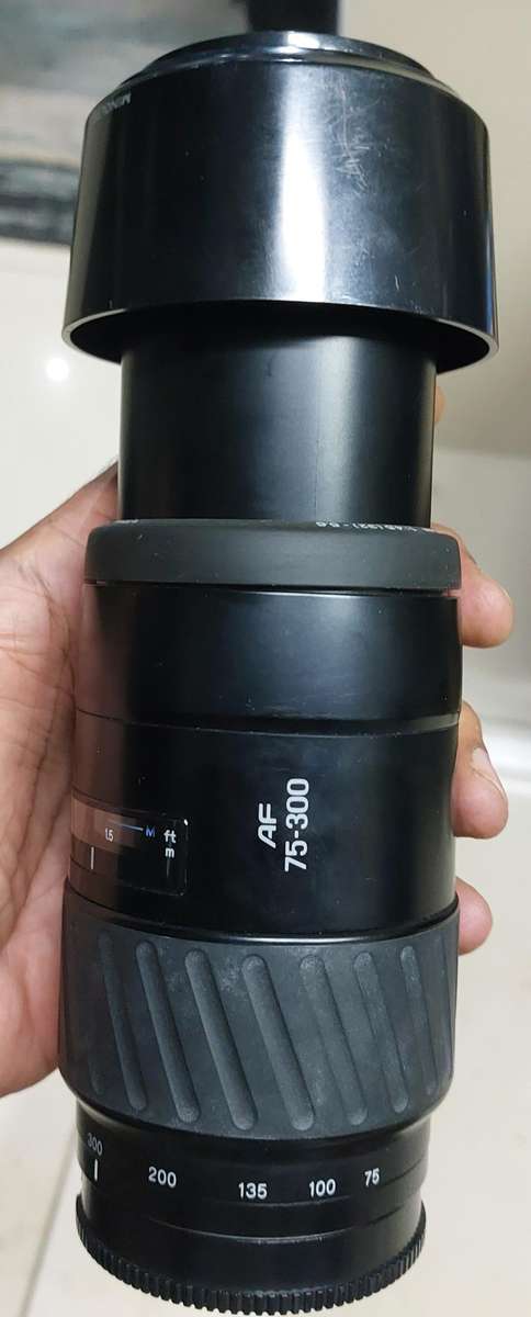 top condition made in Japan minolta camera with huge zoom lens incl jessop lens case and 2 box film