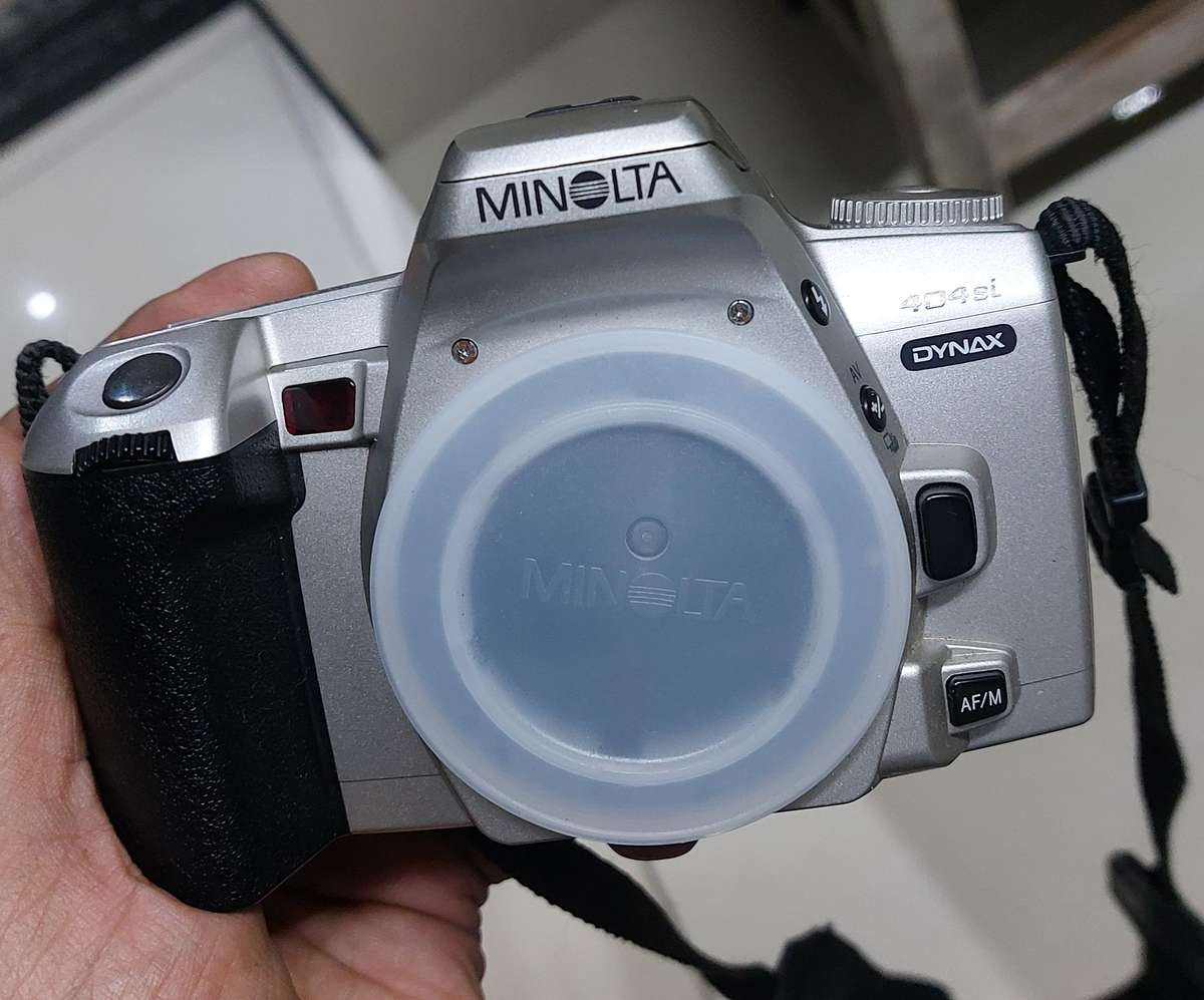 top condition made in Japan minolta camera with huge zoom lens incl jessop lens case and 2 box film