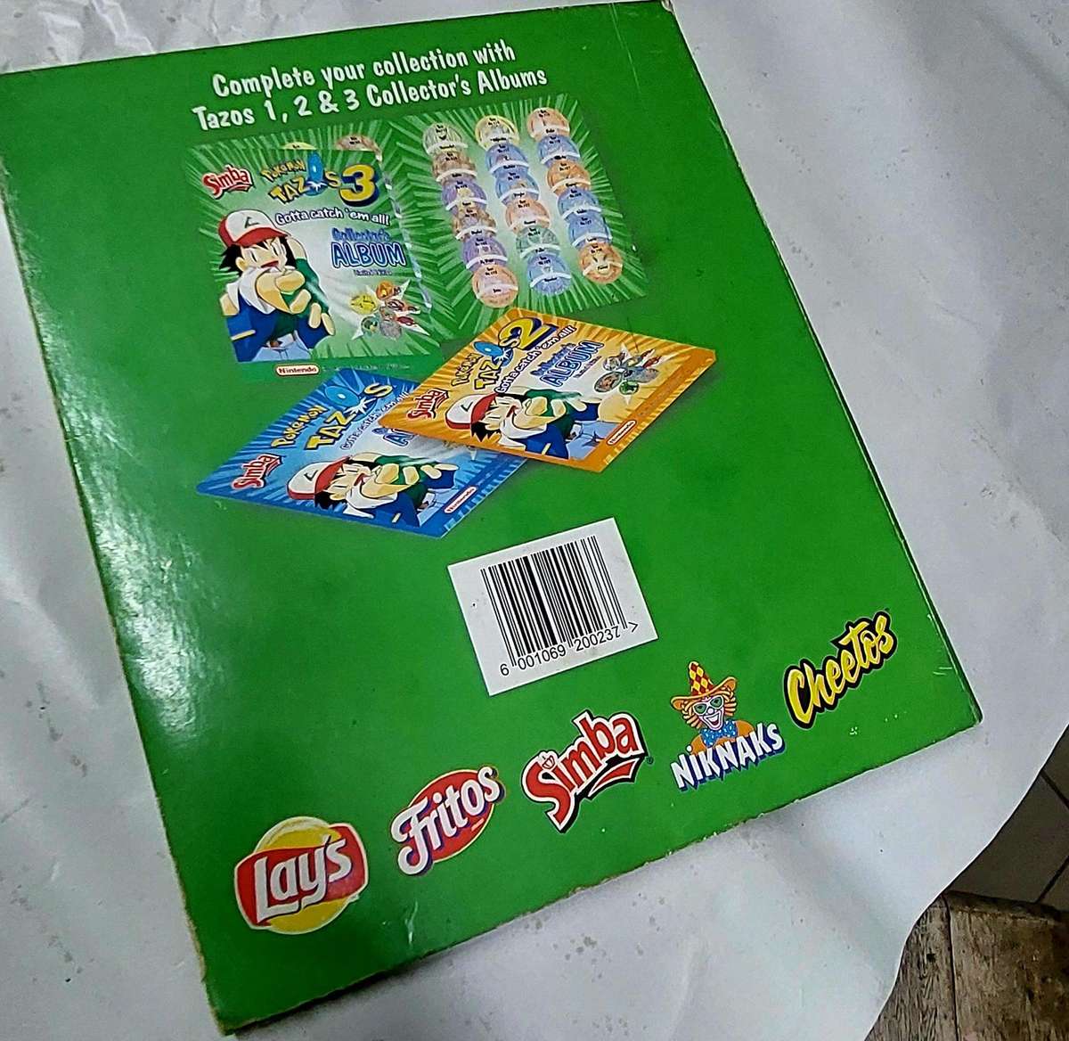 pokemon collectors album with tazzos inside not complete