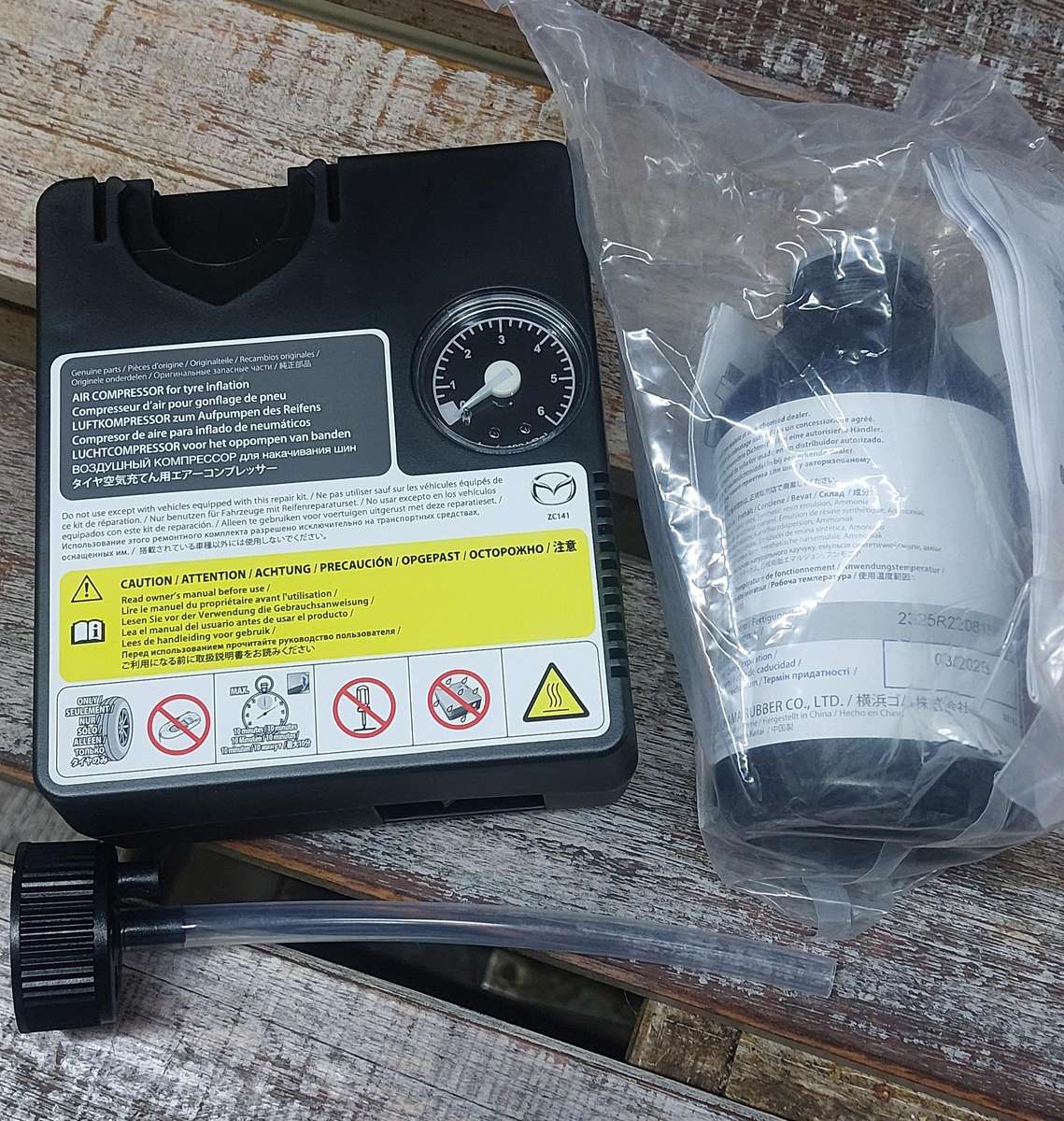 SUV 6 bar mazda tyre mobility kit complete with sealant and pump