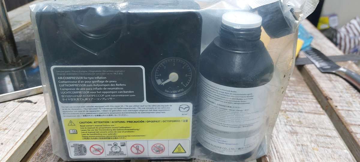 Mazda 6 bar tyre mobility kit include repair liquid