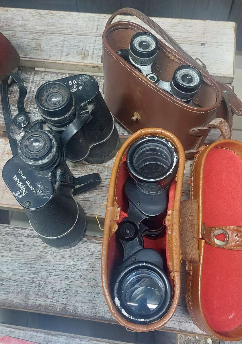vintage binoculars bid for the lot