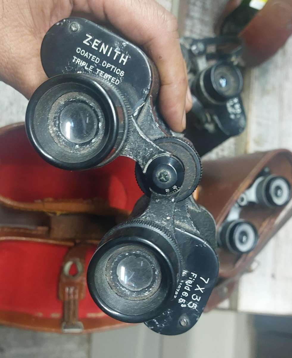 vintage binoculars bid for the lot