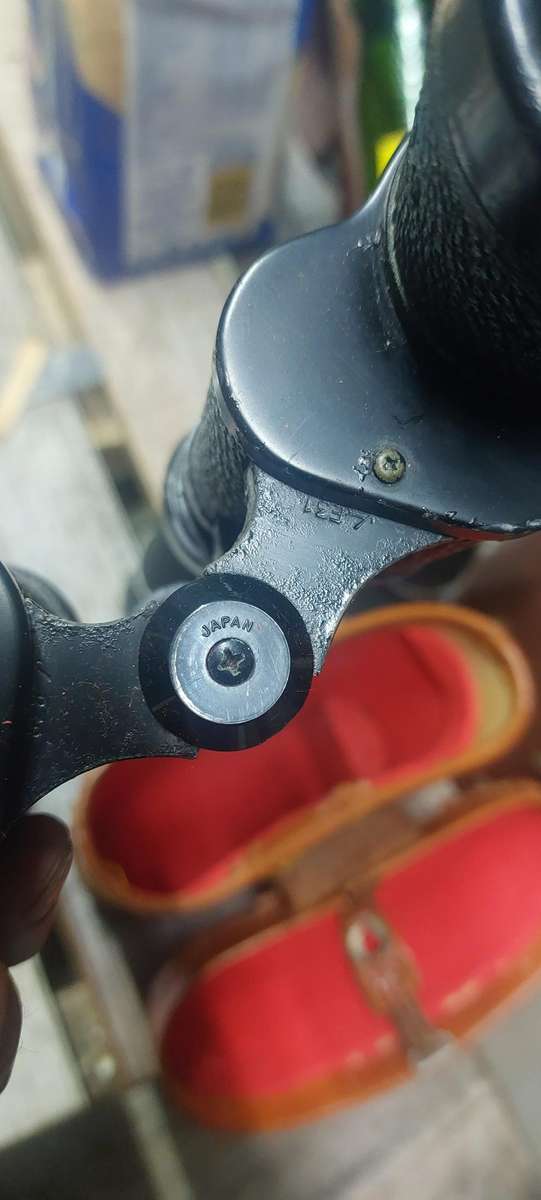 vintage binoculars bid for the lot