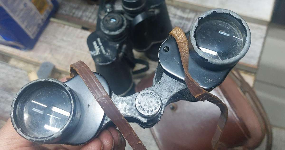 vintage binoculars bid for the lot