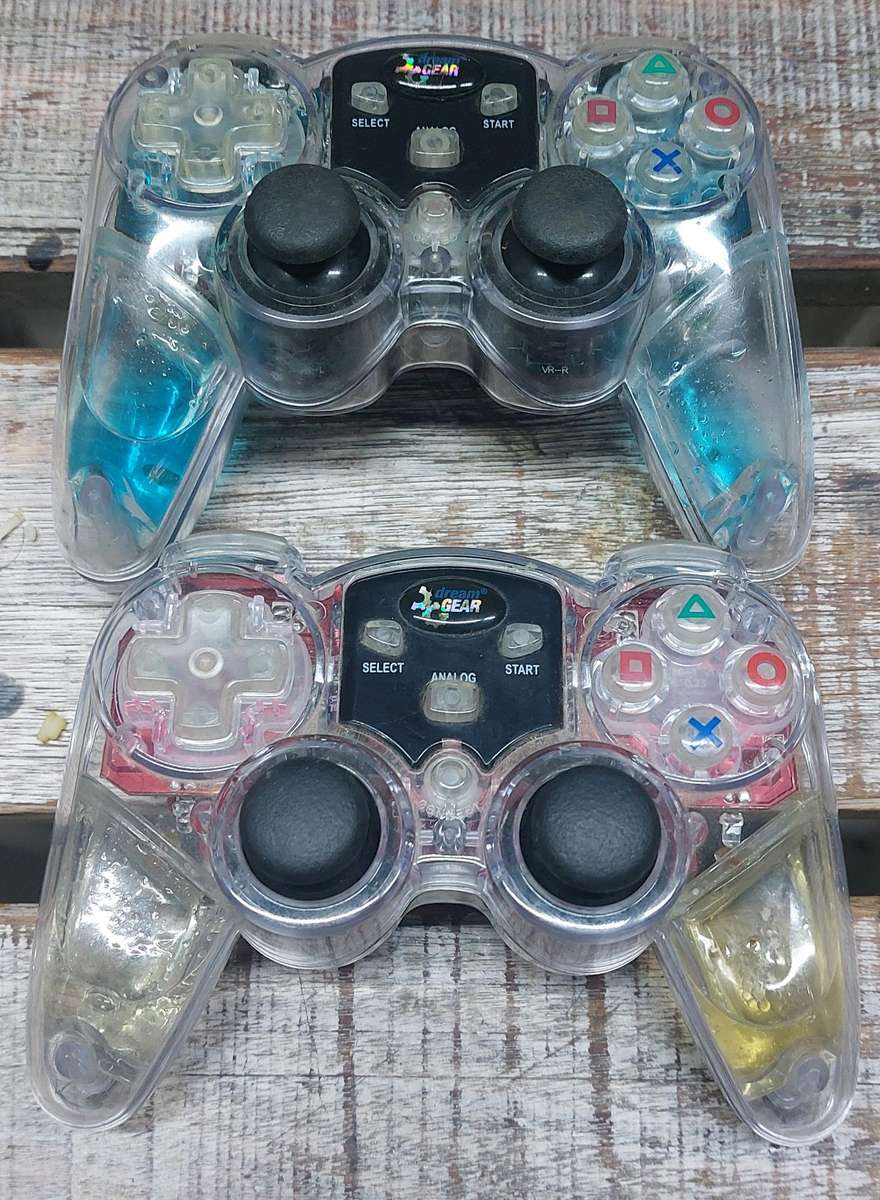 Dream gear lava glo wireless Playstation controller x2 bid for both