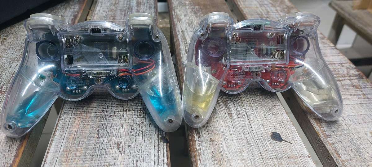 Dream gear lava glo wireless Playstation controller x2 bid for both