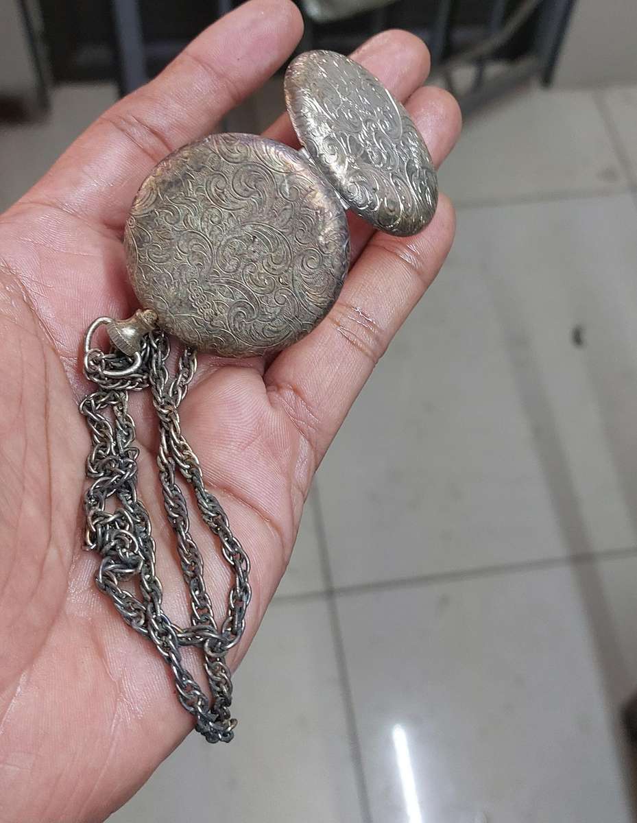 Vintage necklace and locket item very old and tarnished