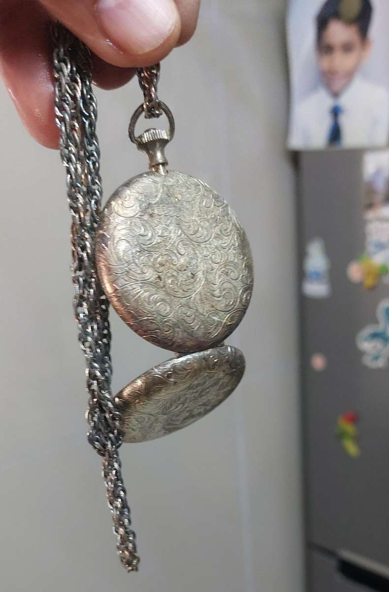 Vintage necklace and locket item very old and tarnished