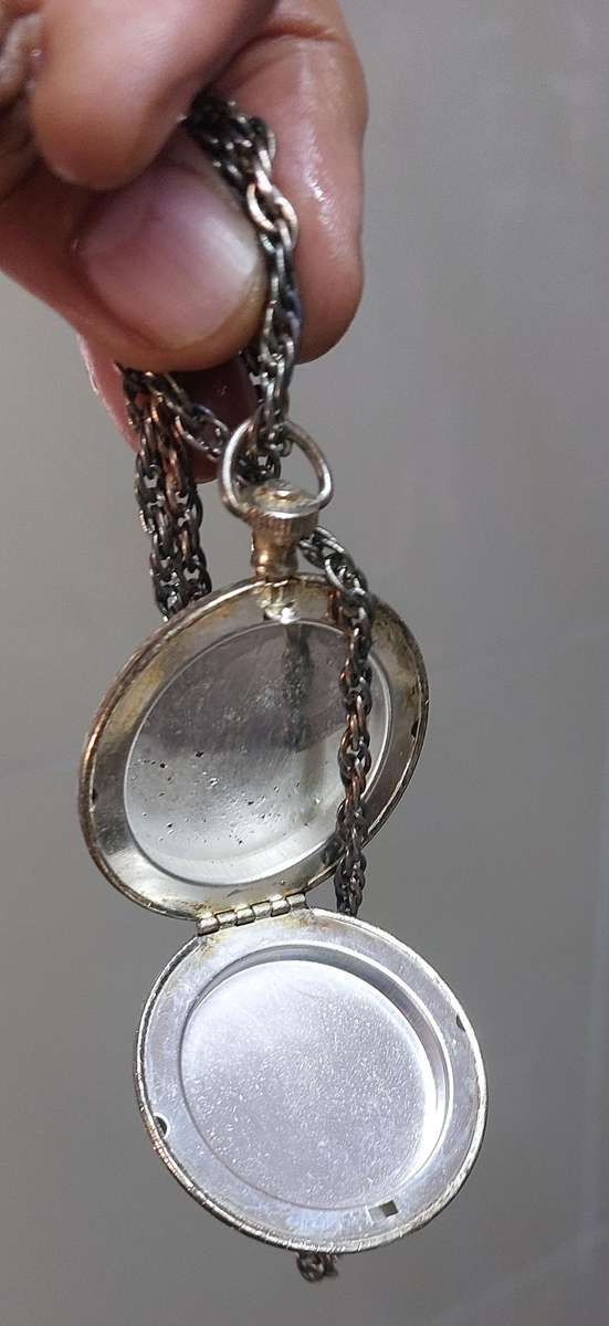 Vintage necklace and locket item very old and tarnished