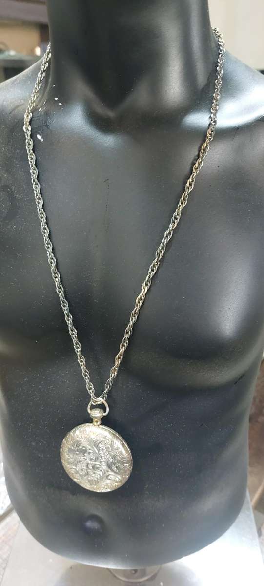 Vintage necklace and locket item very old and tarnished