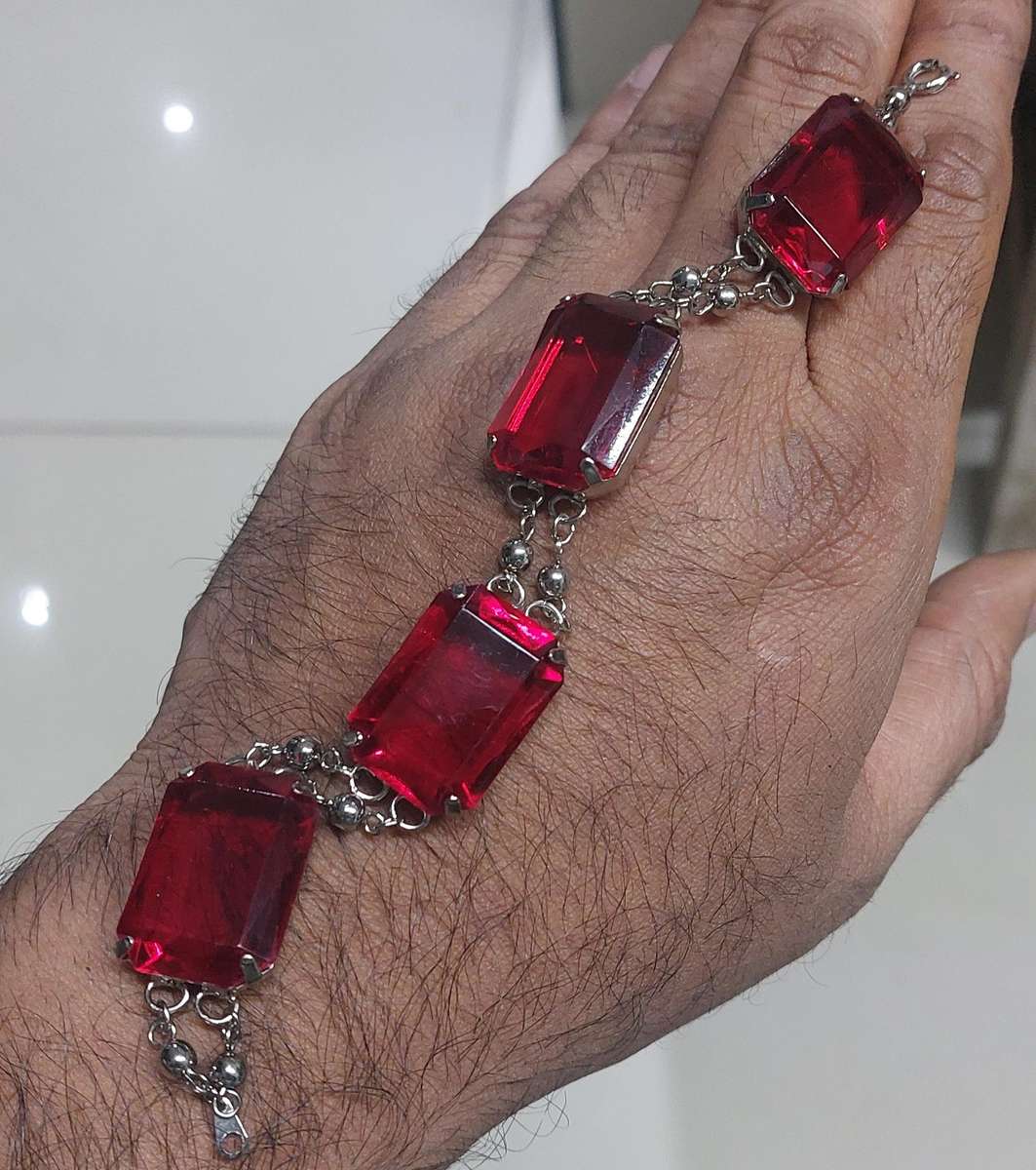 Vintage hand chain unsure of materials