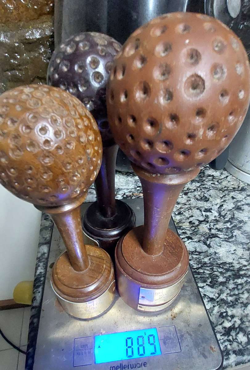 Vintage very heavyvhand carved wood golf trophies bid for all