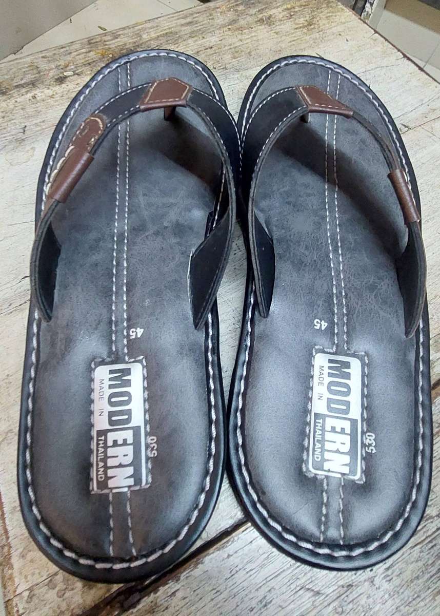 Unwanted gift like new  mens sandals from Thailand used once
