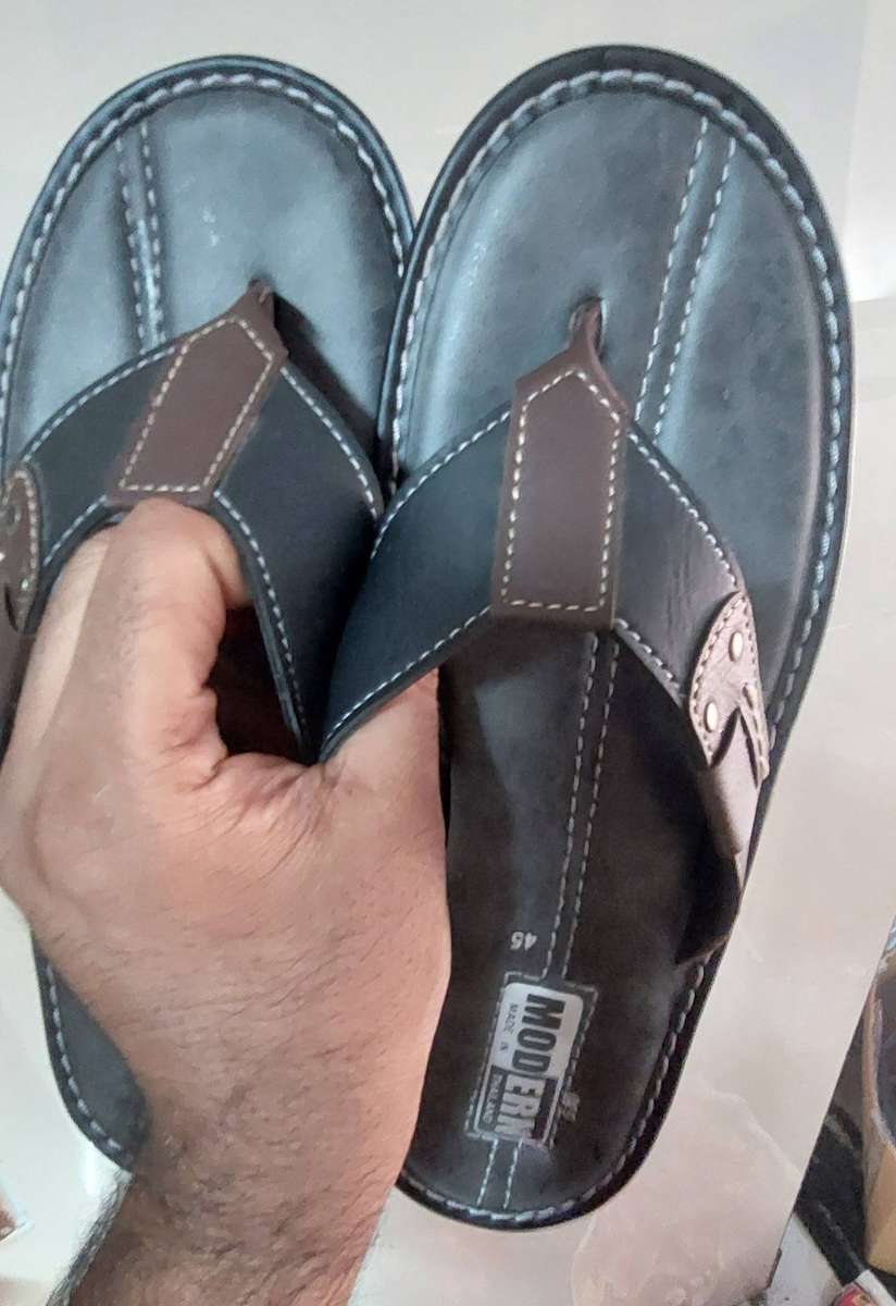Unwanted gift like new  mens sandals from Thailand used once