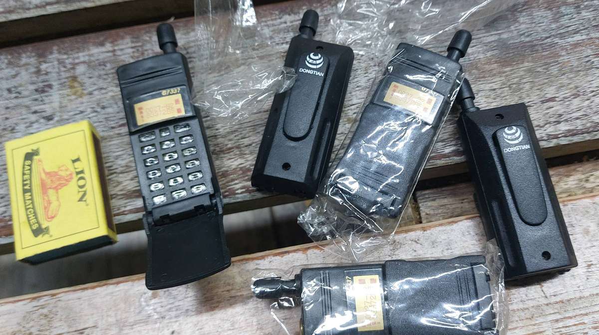 Vintage cellphone lighters never used