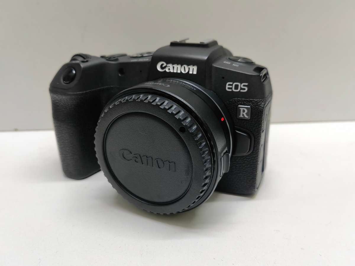 Canon EOS RP Mirrorless camera Body + EF-R adaptor.