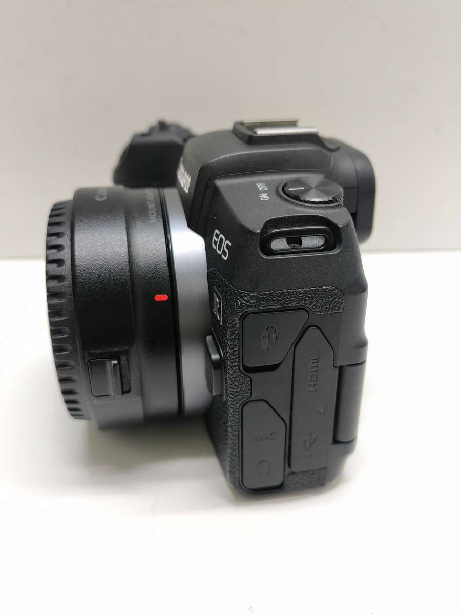 Canon EOS RP Mirrorless camera Body + EF-R adaptor.