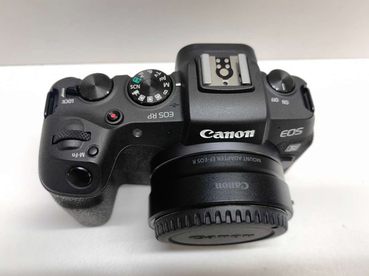 Canon EOS RP Mirrorless camera Body + EF-R adaptor.