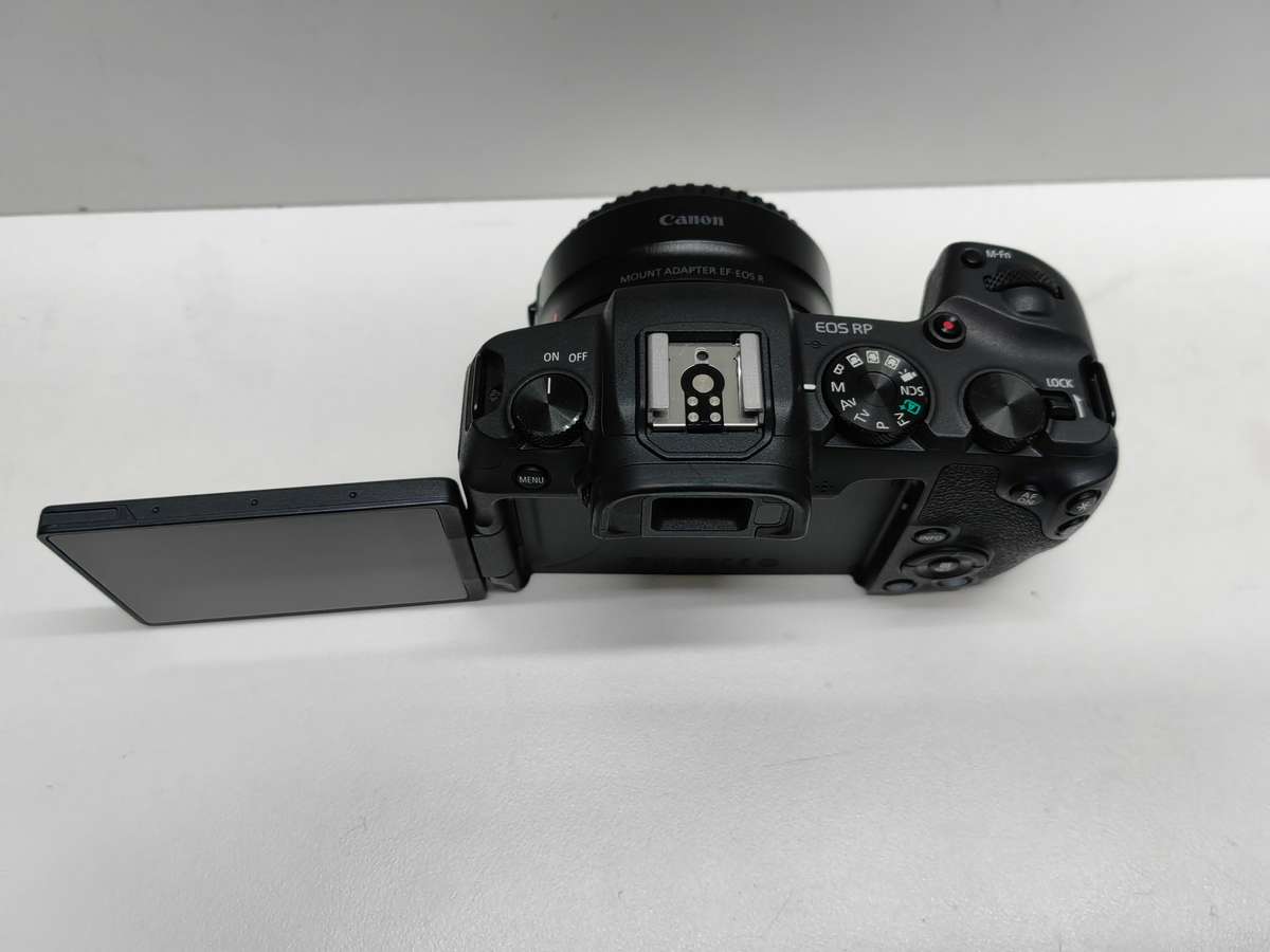 Canon EOS RP Mirrorless camera Body + EF-R adaptor.