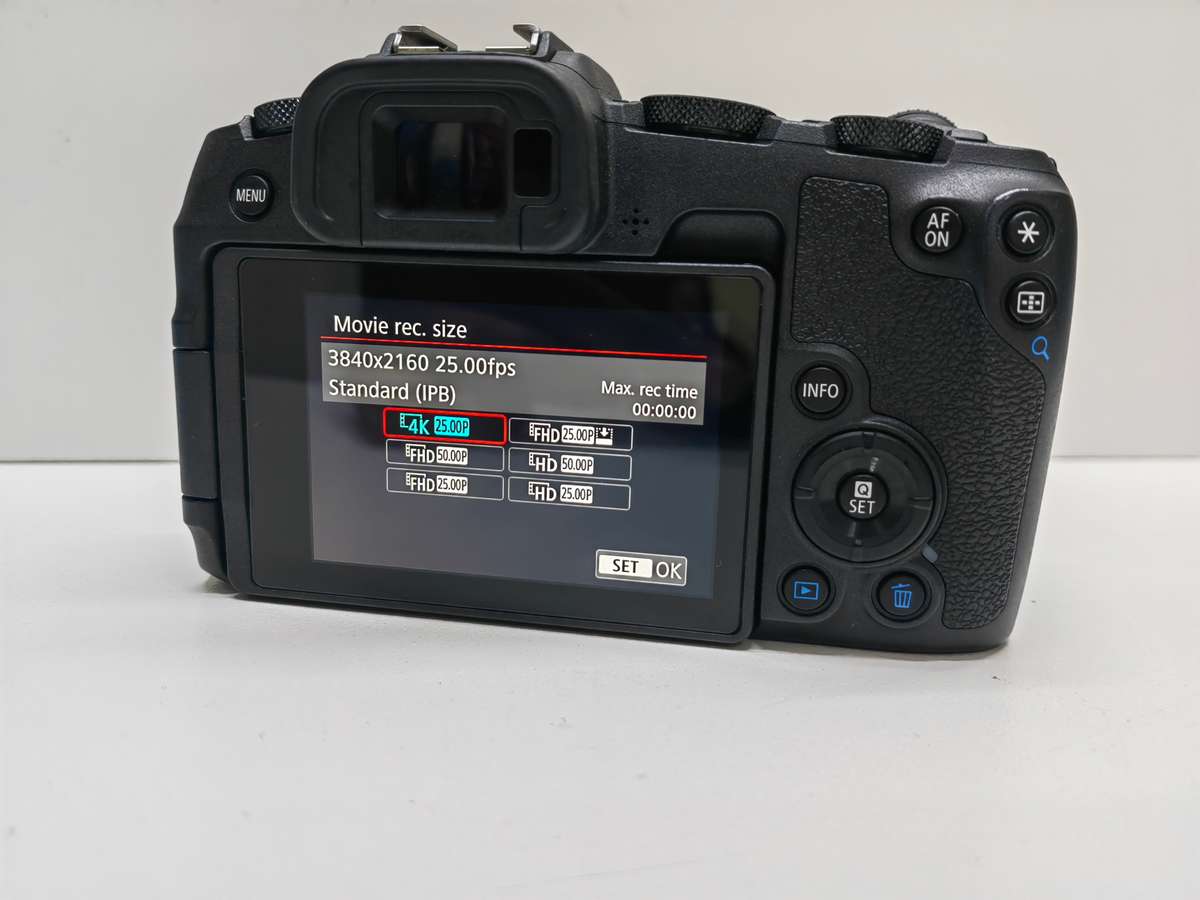 Canon EOS RP Mirrorless camera Body + EF-R adaptor.