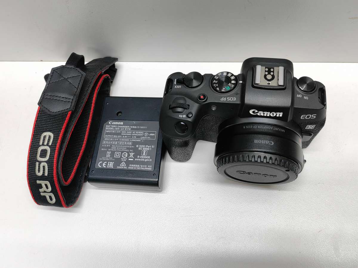 Canon EOS RP Mirrorless camera Body + EF-R adaptor.
