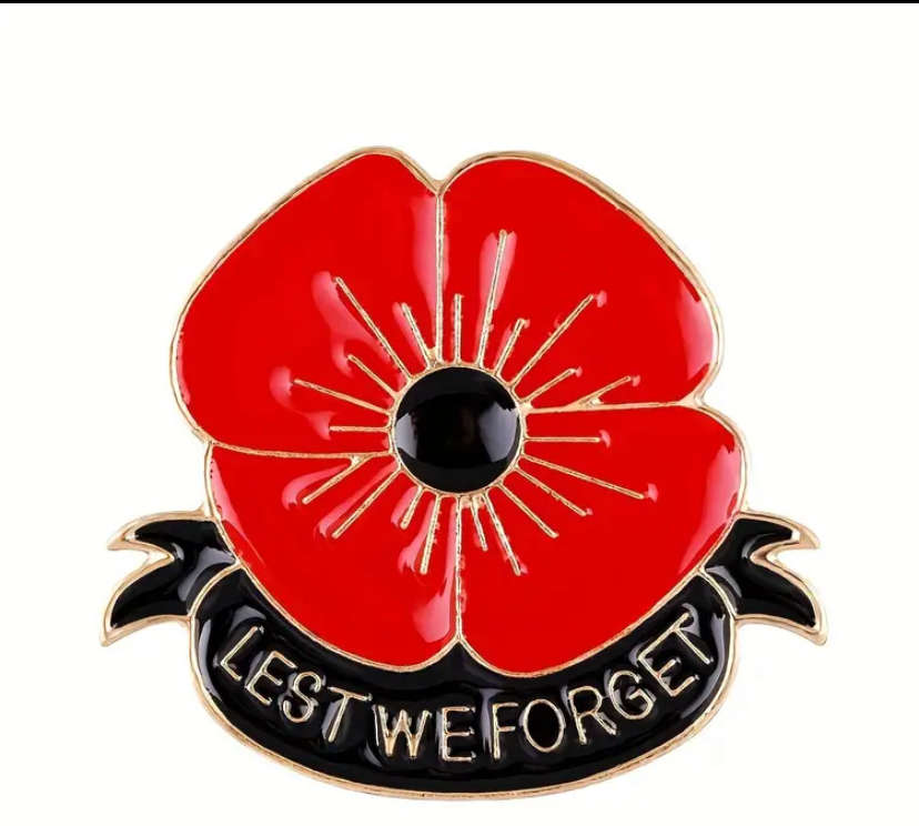 Lapel pin badge (Poppy) lest we forget