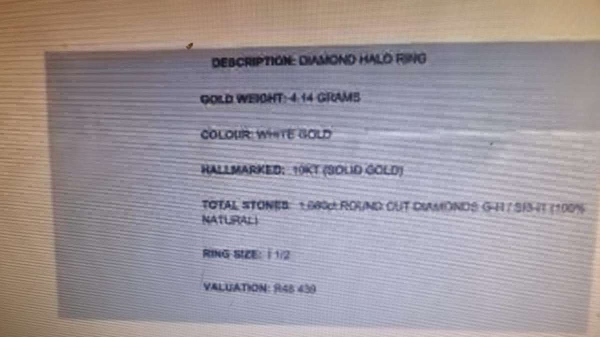 Round cut halo diamond ring