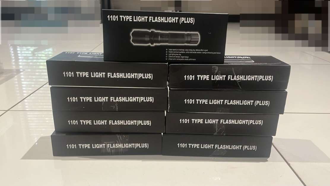 Self Defensive Flashlight With Stun Gun