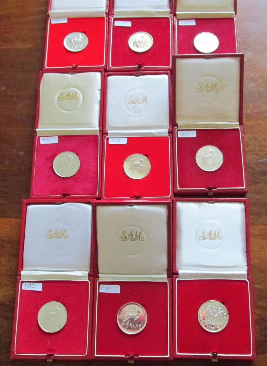 9 UNC. SILVER RANDS IN S.A.M BOXES