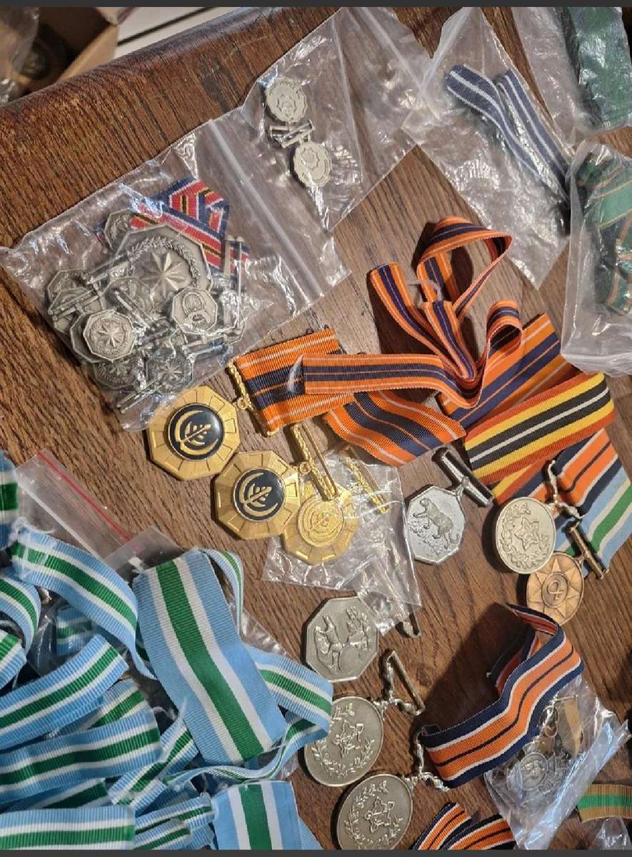 Large lot of SADF medals and ribbons great for resell