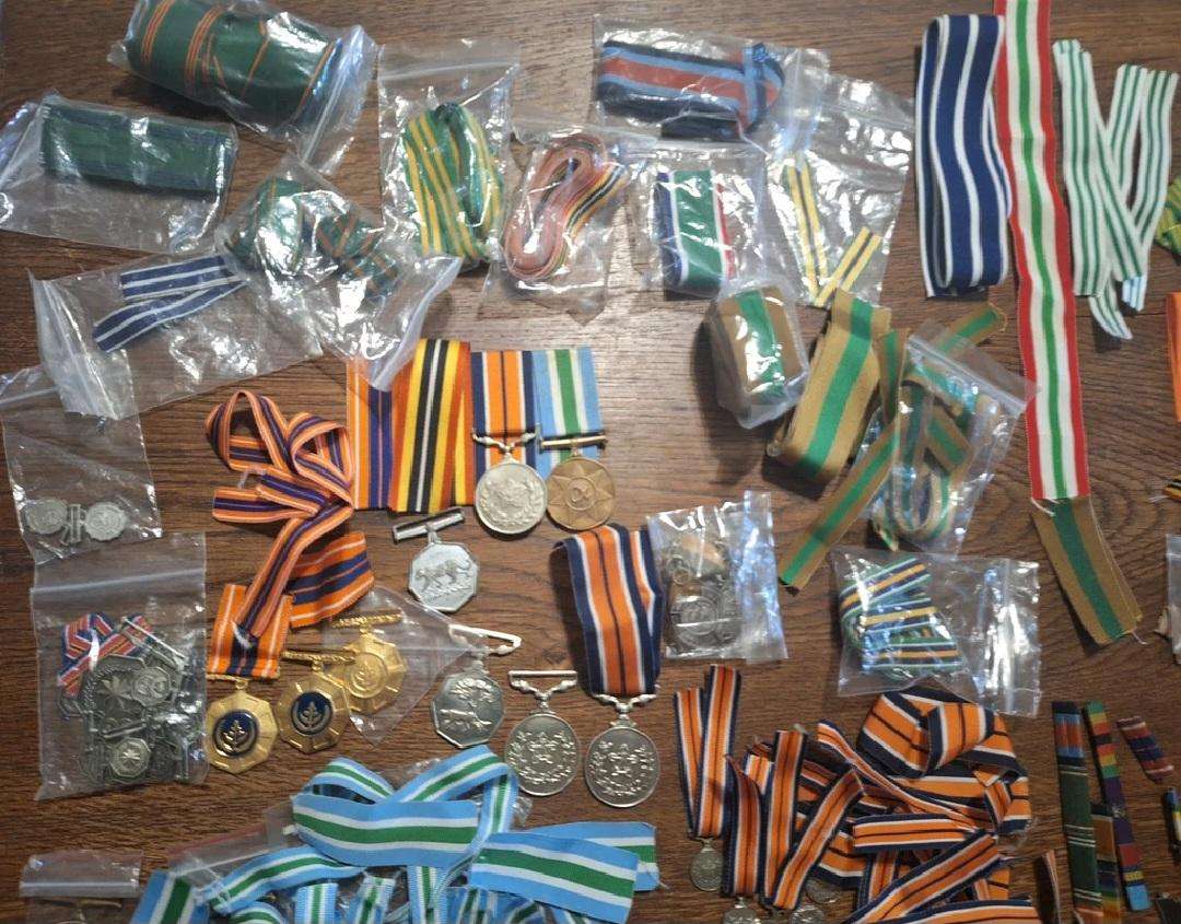 Large lot of SADF medals and ribbons great for resell