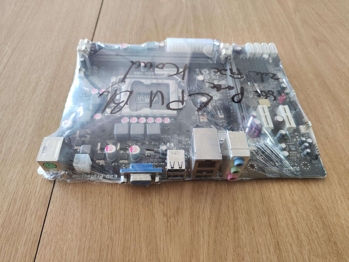 ECS H61H2-M12 2nd/3rd gen Motherboard**Parts or repair**