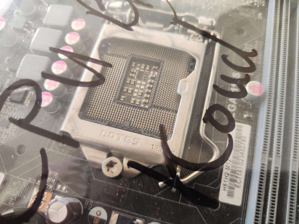 ECS H61H2-M12 2nd/3rd gen Motherboard**Parts or repair**