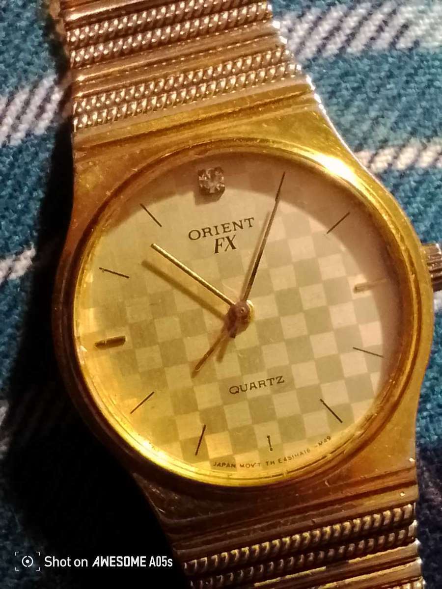 Orient quartz mans watch