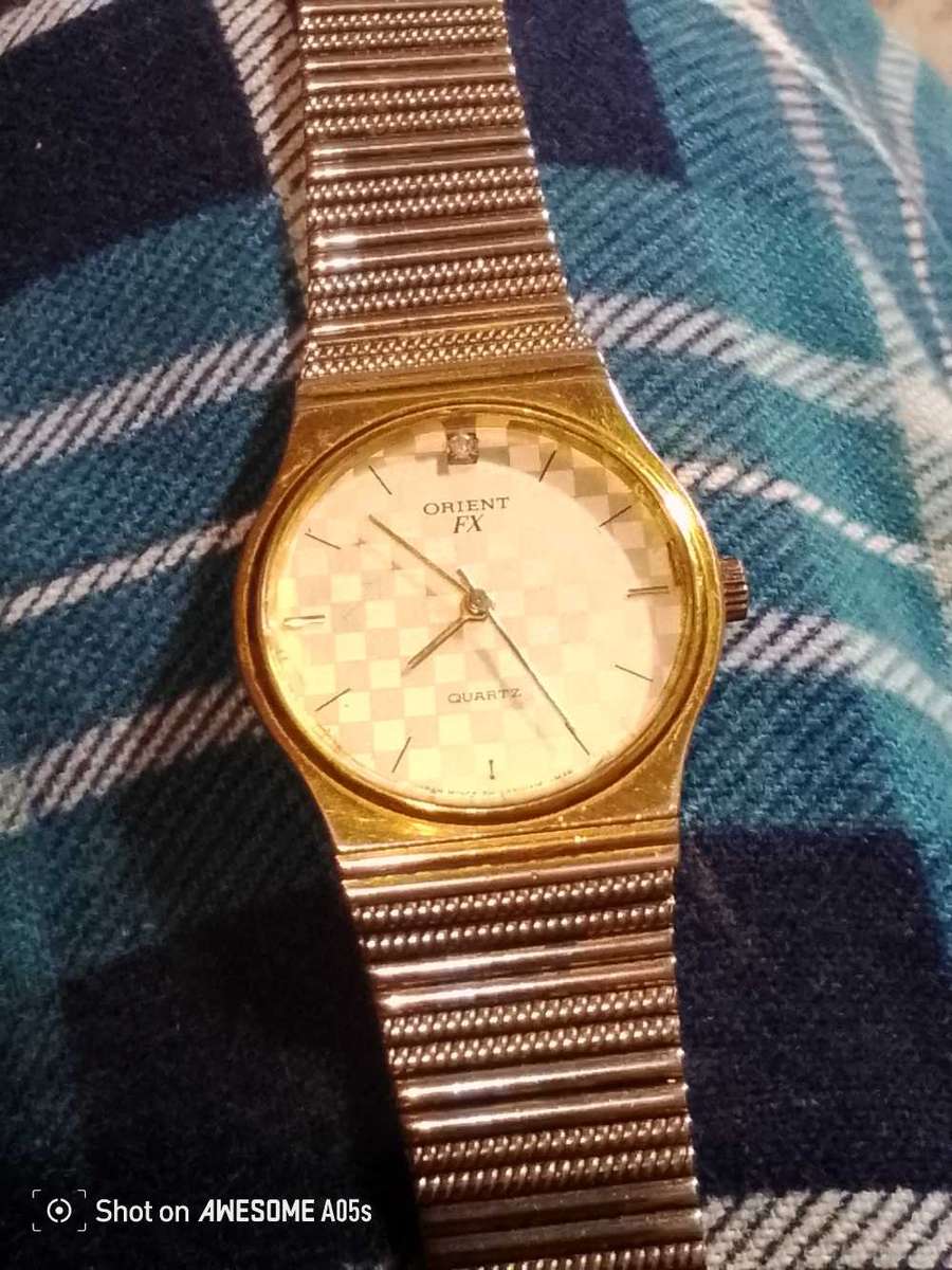 Orient quartz mans watch