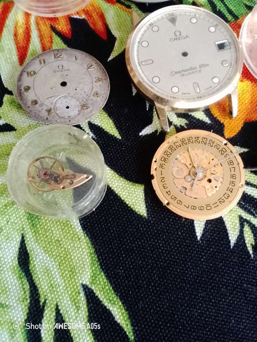 Omega dials/balances/full working 1430 movement