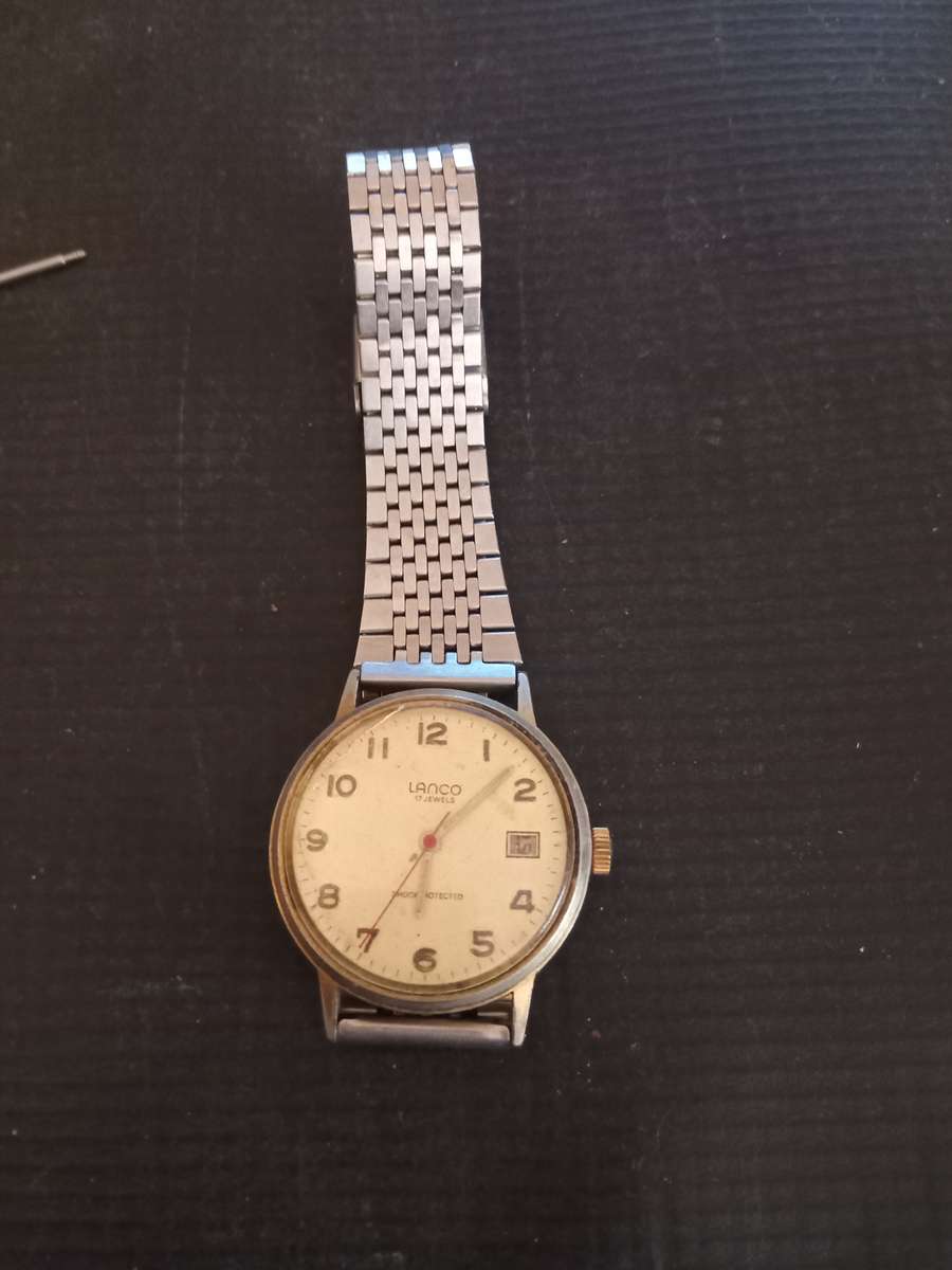 Lanco date Men's watches. Works 5 seconds and stops