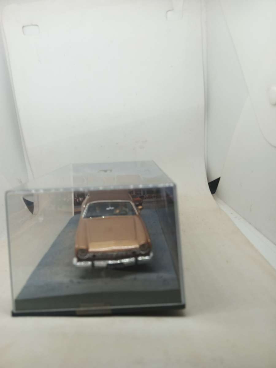 007 AMC Matador Coupe - The man with the golden gun -  scale 1/43. Sealed. with book