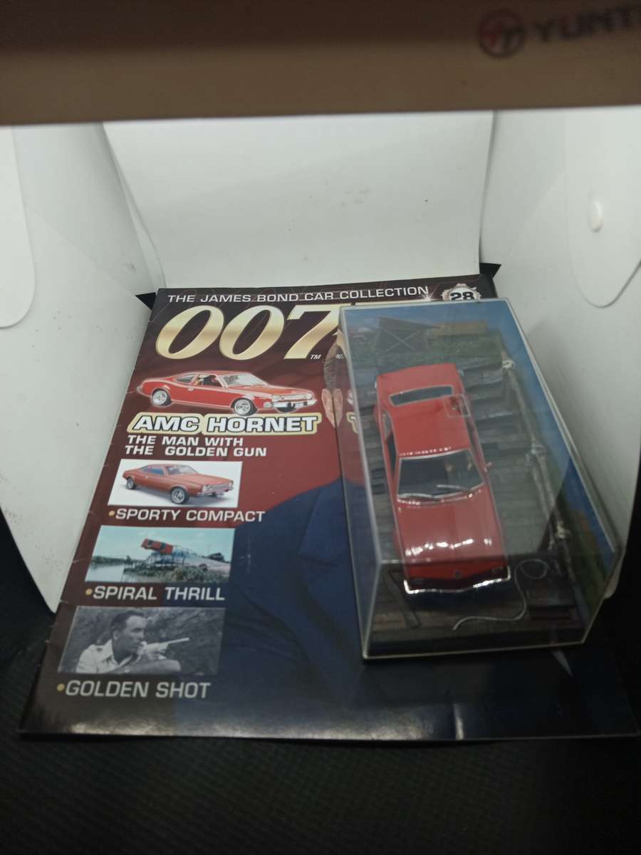 007 AMC Hornet - The man with the golden gun -  scale 1/43. Sealed. with book