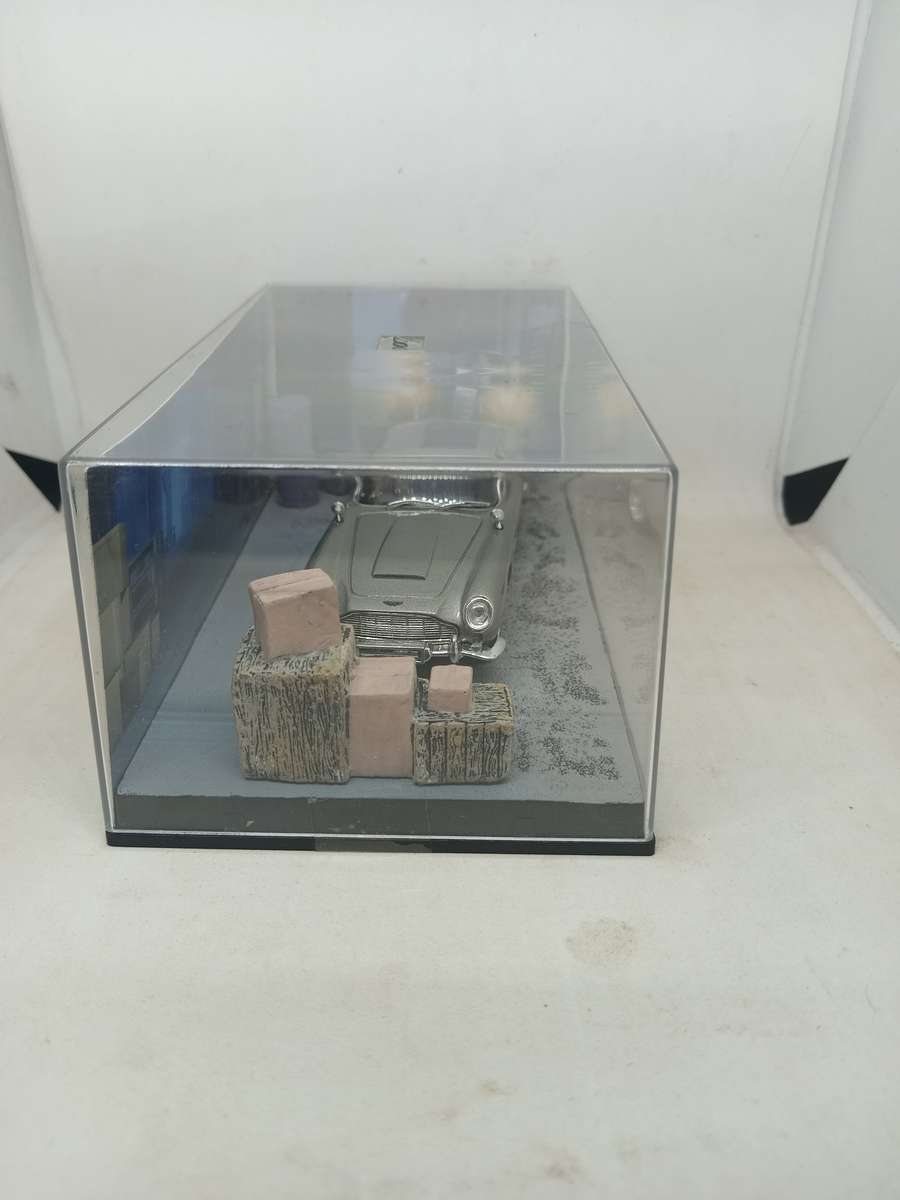 007 Aston Martin DBS - Goldeneye - scale 1/43. Sealed. With Book