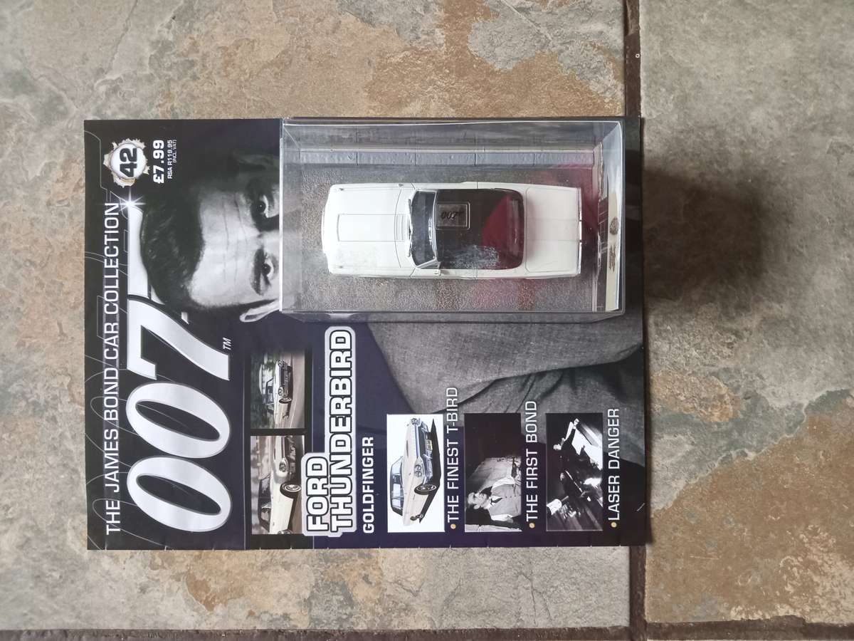 007 Ford Thunderbird - Goldfinger - scale 1/43. Sealed. With Book