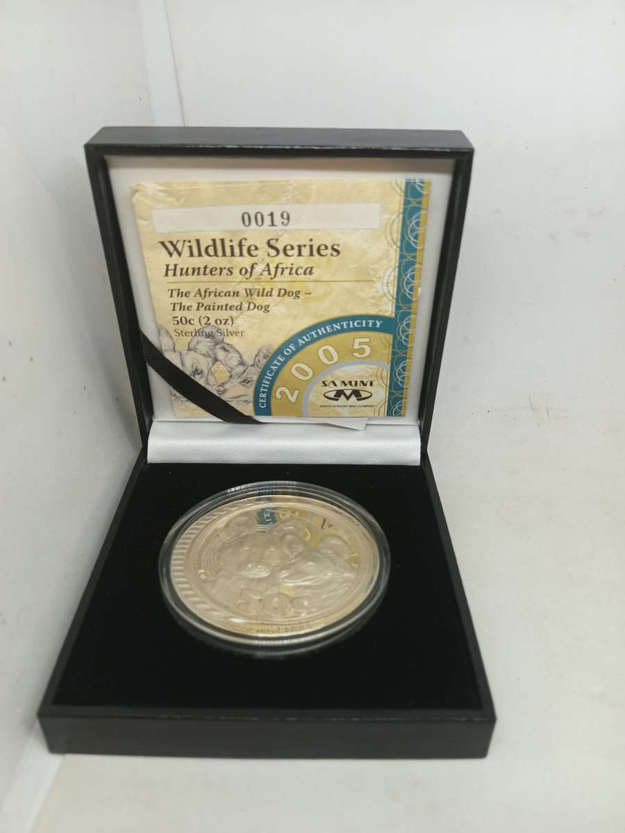 2 Oz Wildlife Series Hunter of Africa Wild Dogs sterling Silver 50c