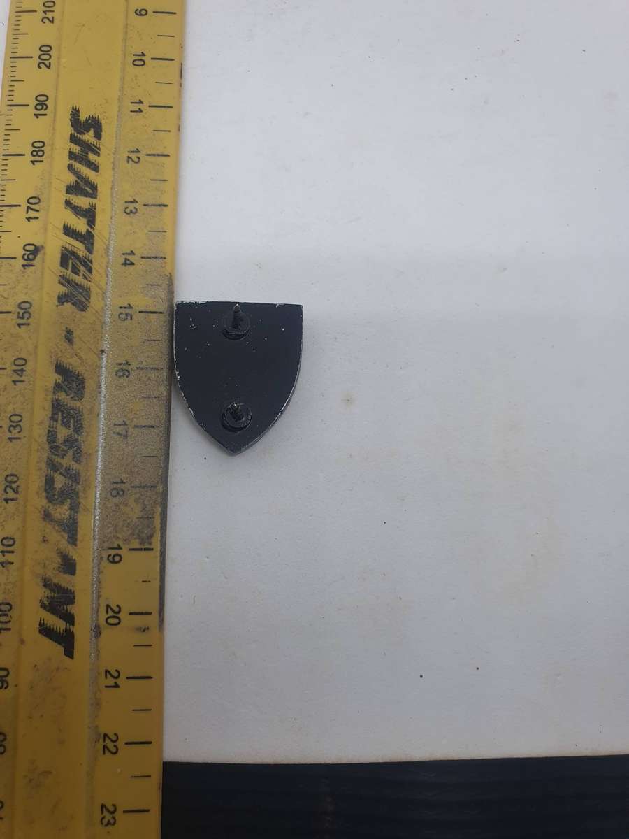 61 Meg Breast Pin. Origin Unknown 2 cm